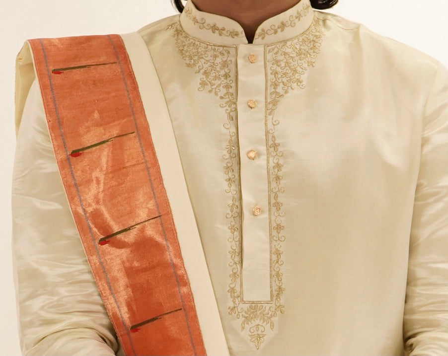 Light gold tissue Pattu Pancha set with Paithani border