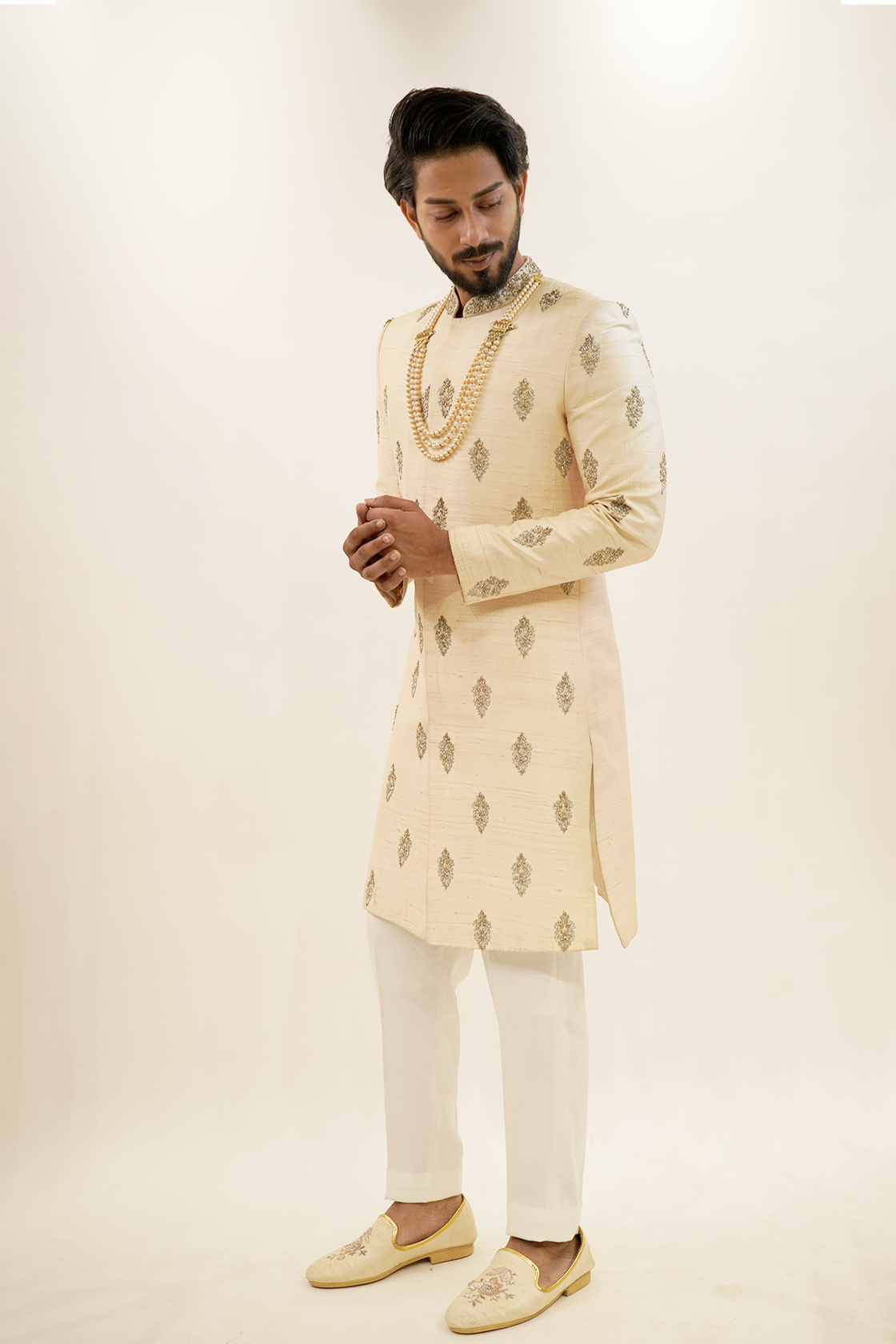 Pure Raw silk sherwani with traditional butta design