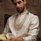 Off-white pure pattu pancha set with zari and resham embroidery