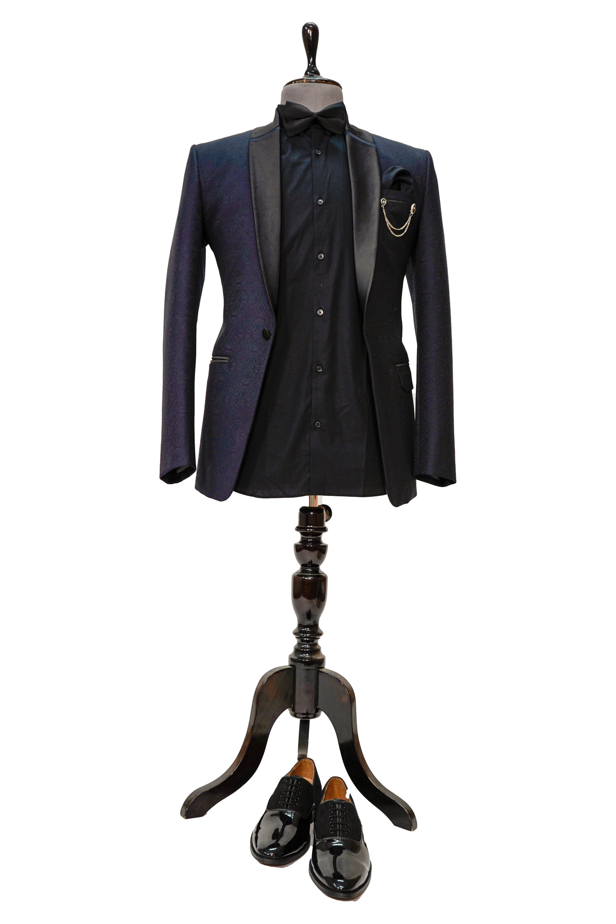 A midnight blue jacquard 2-piece tuxedo displayed on a mannequin, featuring a jacket with satin lapels and a shirt.