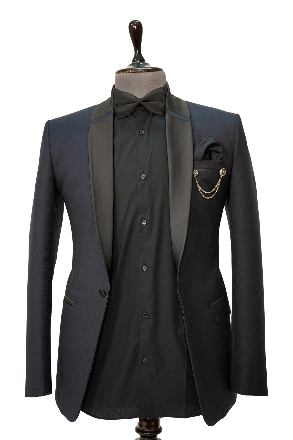 A midnight blue jacquard 2-piece tuxedo displayed on a mannequin, featuring a jacket with satin lapels and a shirt.