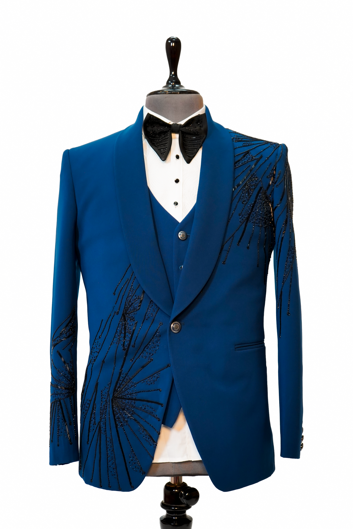 A teal blue 3-piece tuxedo with intricate curtdana embroidery displayed on a mannequin
