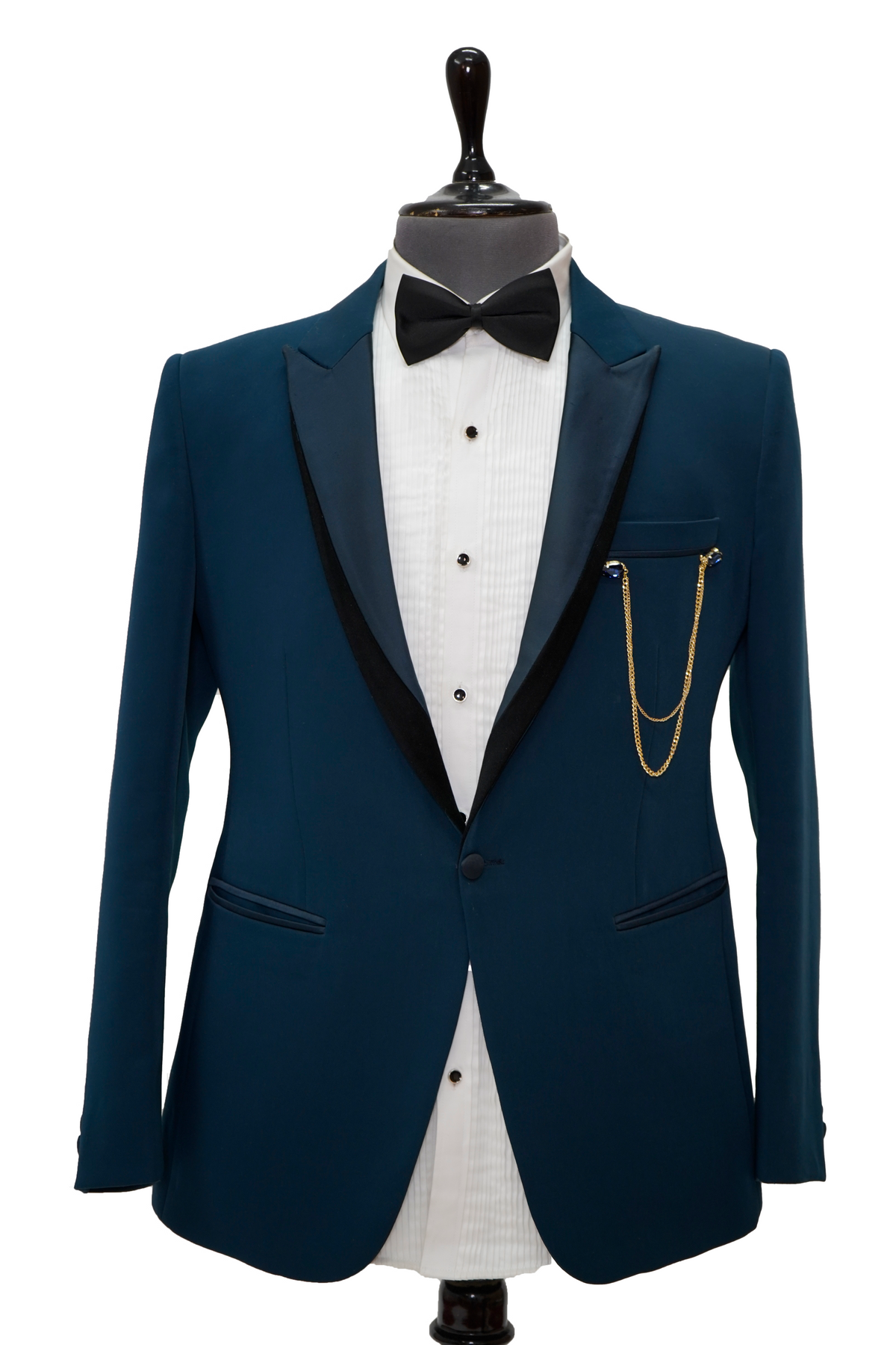 A teal blue two-piece classic tuxedo with black lapels displayed on a mannequin. It includes a white dress shirt and a black bow tie.