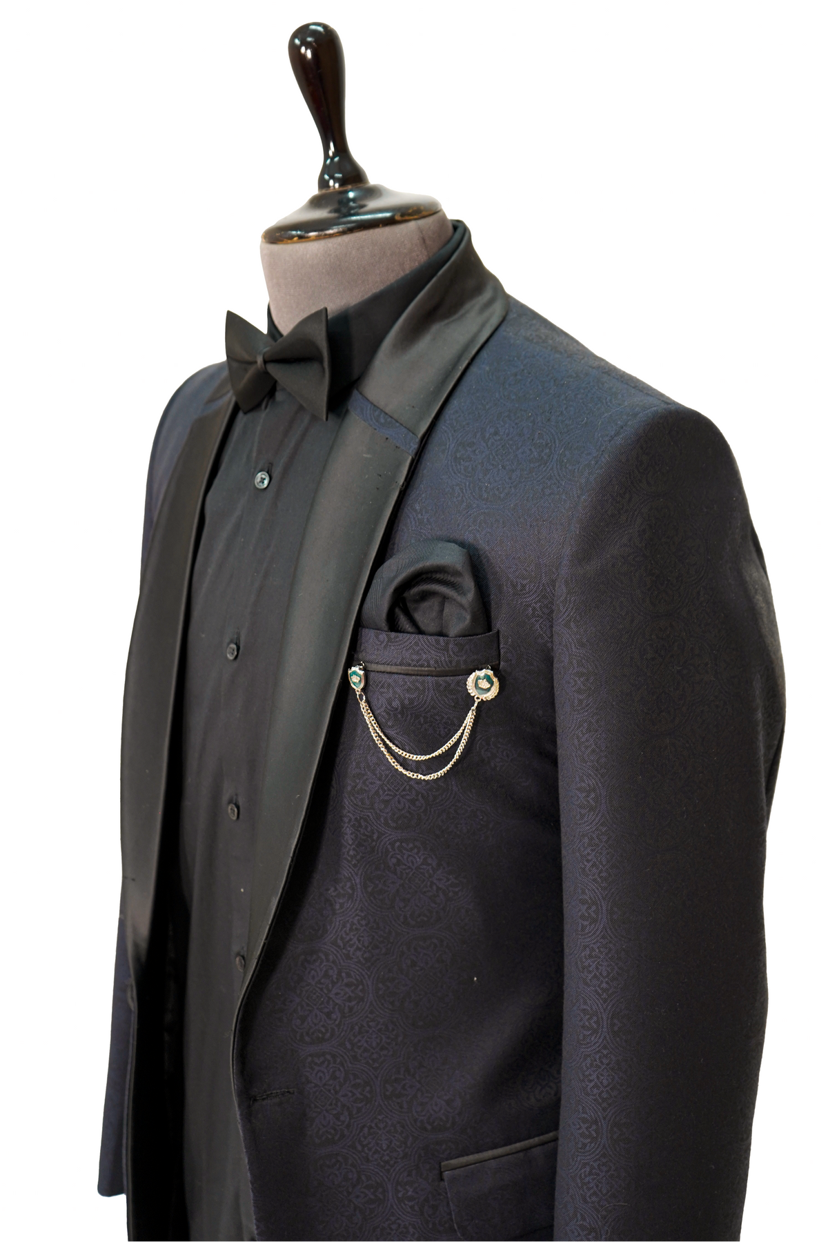 A midnight blue jacquard 2-piece tuxedo displayed on a mannequin, featuring a jacket with satin lapels and a shirt.