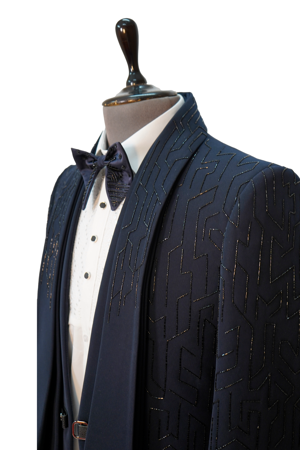 A Midnight Blue 5-Piece Designer Tuxedo displayed on a mannequin, consisting of a blue woolcrepe jacket, white vest, white shirt, blue bow tie, and blue trousers.