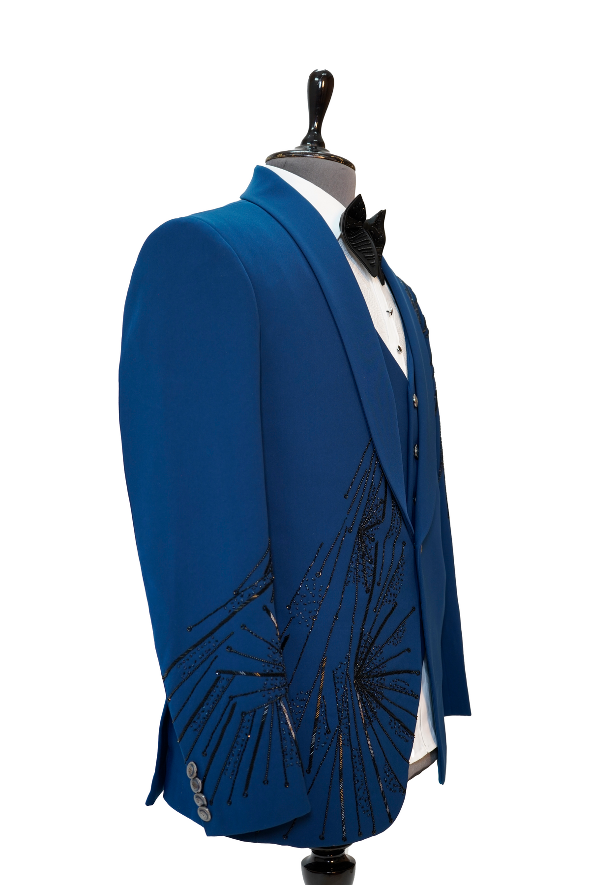 A teal blue 3-piece tuxedo with intricate curtdana embroidery displayed on a mannequin