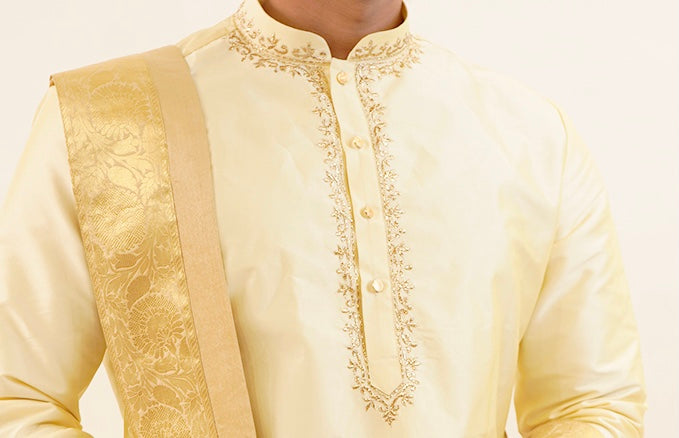 Cream gold semi pattu pancha set with zari work