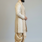 Man wearing a traditional beige kurta with a white vest on a plain background