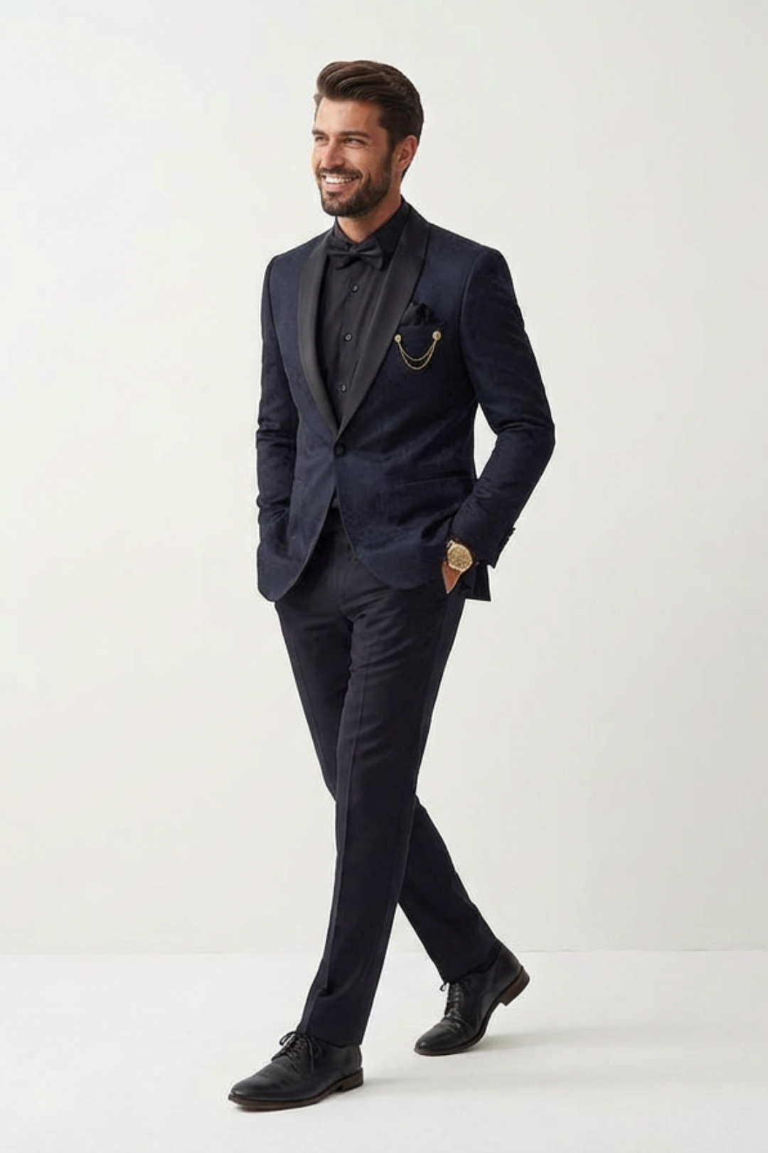 Man wearing a black suit with a white shirt on a white background