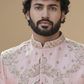 Men's Peach Wedding Sherwani with Matching Dhoti and Intricate Pelli Gold Work