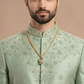 Regal Serenity: Pista Green Embroidered Silk Sherwani Ensemble