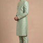 Regal Serenity: Pista Green Embroidered Silk Sherwani Ensemble