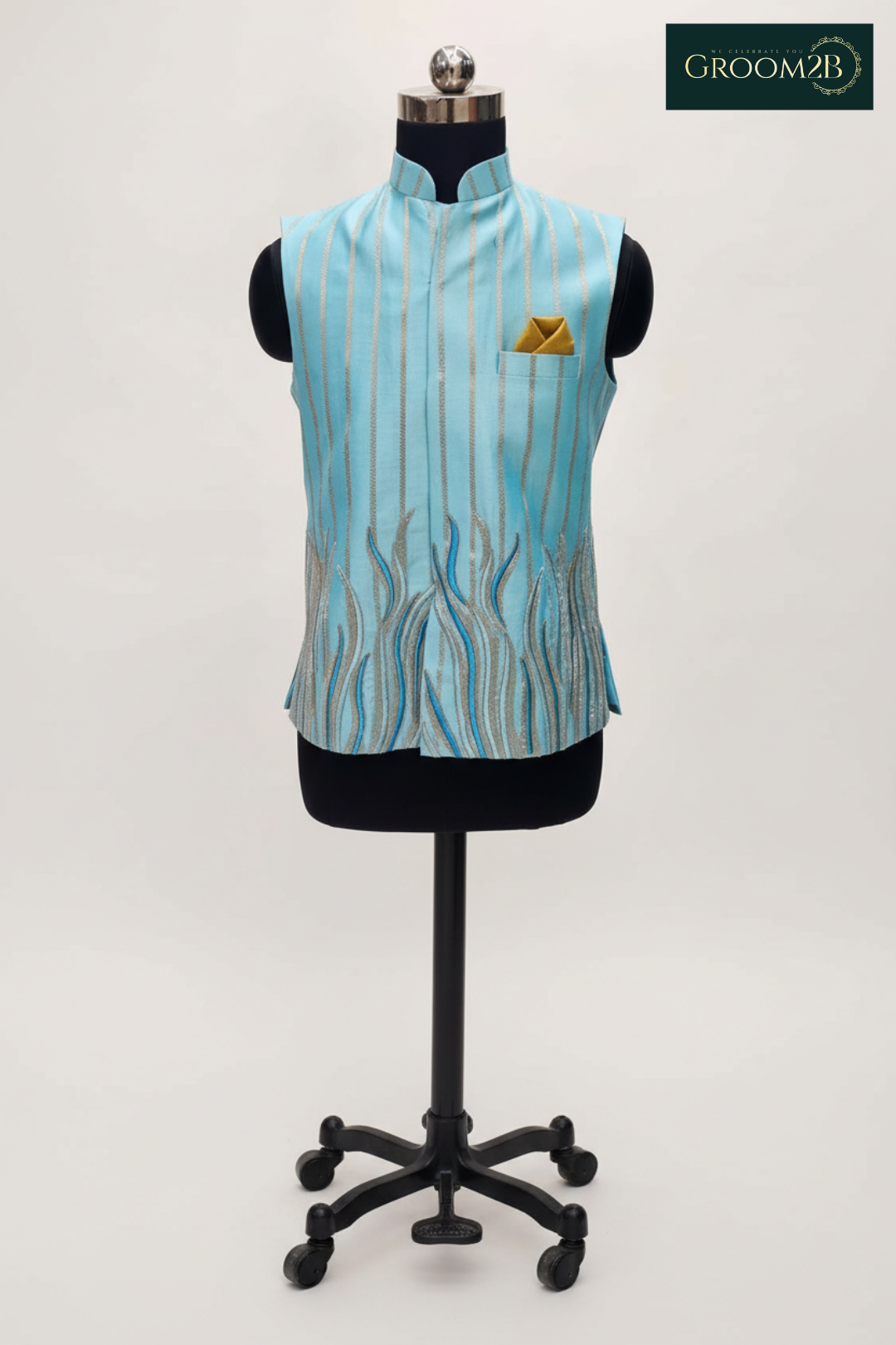 Light blue vest with a pattern on a mannequin against a white background, branded 'Groom2B'.
