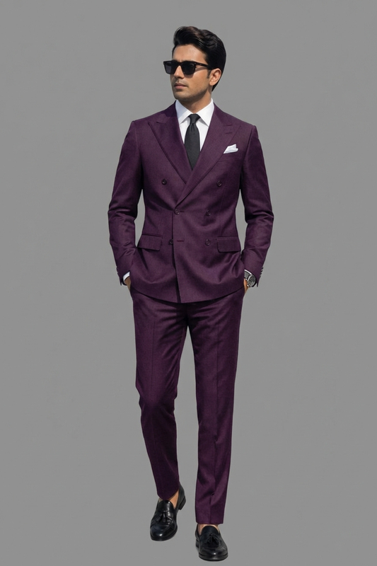 Man wearing a purple suit with sunglasses on a gray background