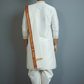 Person wearing a traditional white kurta with a red and gold border against a gray background