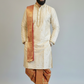 Man wearing a traditional kurta with a plain background