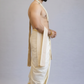 Man wearing a white dhoti with a plain background