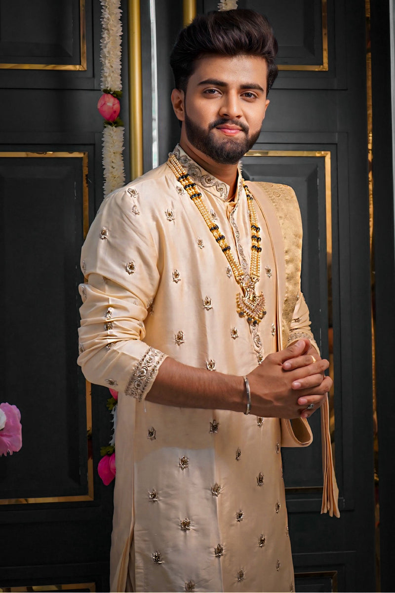 Beige gold pure Pattu Pancha set with detailed zardosi work