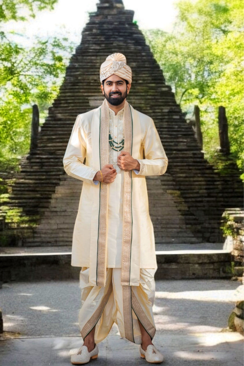 Cream Pattu Pancha with Zari work on neck and cuffs with contrast piping on border