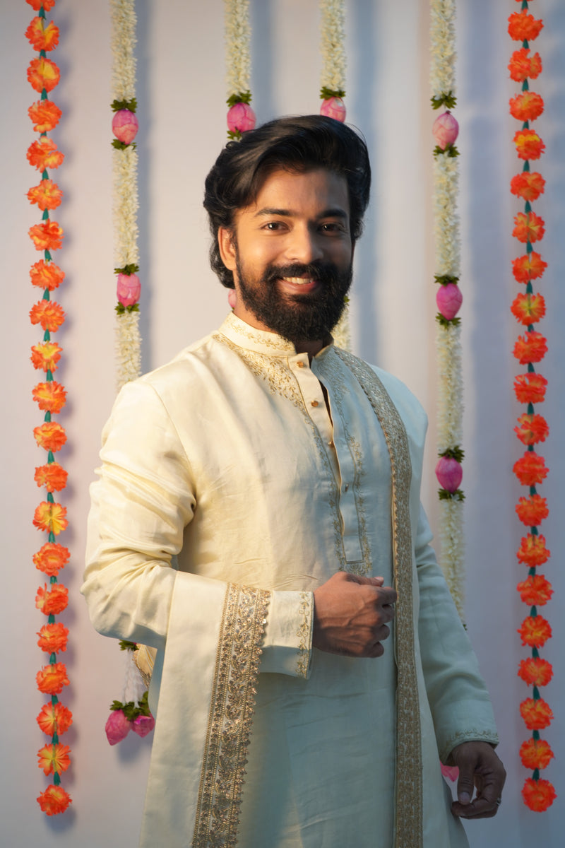 Cream tissue pattu pancha set with zari work