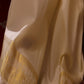 Off-white pure pattu pancha set with zari and resham embroidery