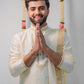 Off-white semi pattu pancha set with zari work on collar and cuffs