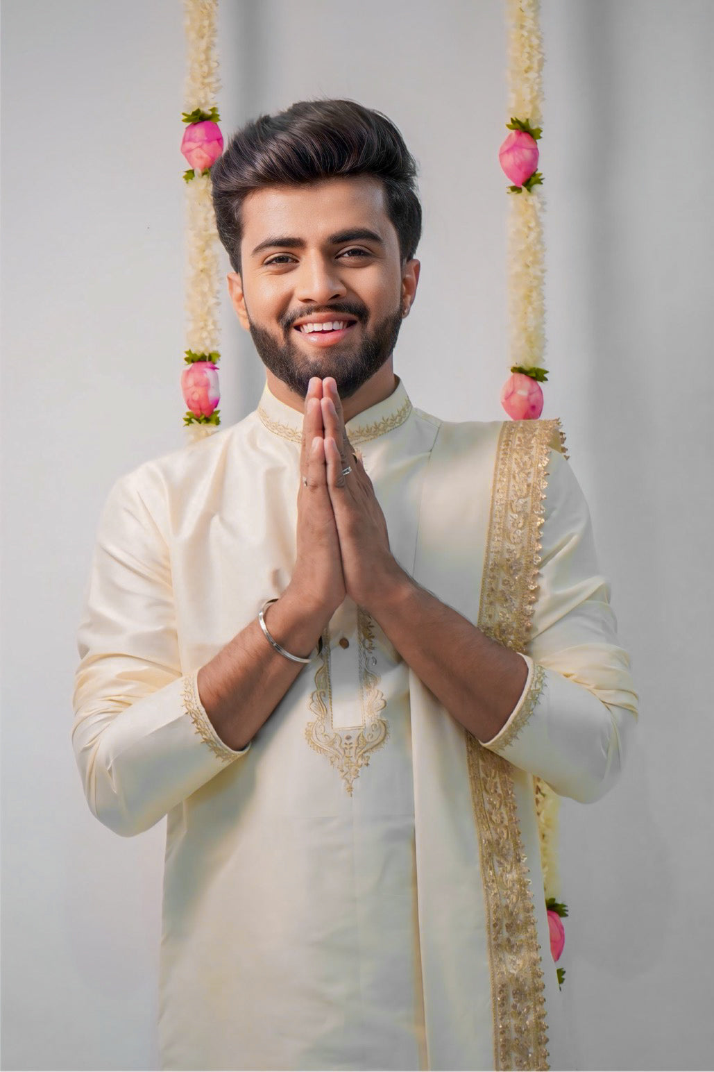 Off-white semi pattu pancha set with zari work on collar and cuffs